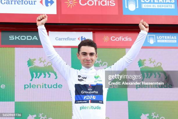 Lenny Martinez of France and Team Groupama - FDJ celebrates at podium as White Best Young Rider Jersey winner during the 78th Tour of Spain 2023,...