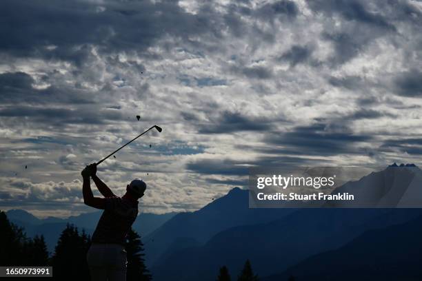 Matt Wallace of England plays their second shot on the 14th hole during Day One of the Omega European Masters at Crans-sur-Sierre Golf Club on August...