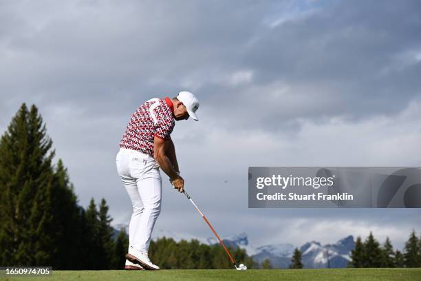 Matt Wallace of England plays a shot on the 15th hole during Day One of the Omega European Masters at Crans-sur-Sierre Golf Club on August 31, 2023...