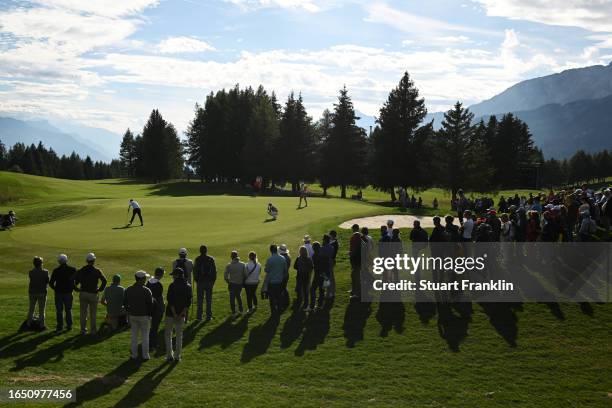 General view of the 15th green as Matt Fitzpatrick of England collects his ball from the hole during Day One of the Omega European Masters at...