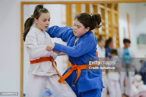female judo training session - judo kids stock pictures, royalty-free photos & images