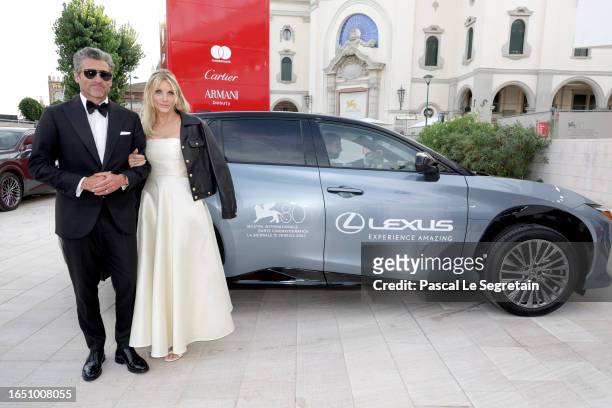 Patrick Dempsey and Jillian Fink arrive on the red carpet ahead of the "Ferrari" screening during the 80th Venice International Film Festival at...