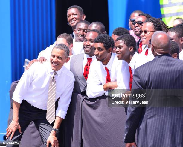 President Barack Obama poses with Role Models of Excellence students during an appearance at Port of Miami on March 29, 2013 in Miami, Florida.