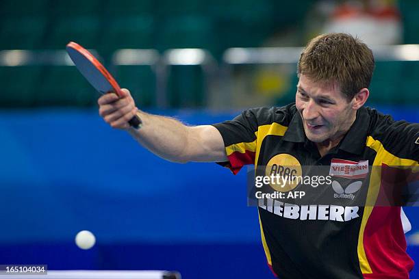 Bastian Steger of Germany returns a shot during his match against Sayed Lashin of Egypt at the World Team Classic Table Tennis game in Guangzhou,...