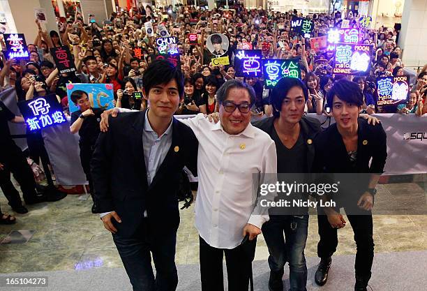 Cast members Vic Chou, director Ronny Yu, Ekin Cheng and Wu Zhun of "Saving General Yang" speaks to fans at a meet and greet event in Square 2 on...