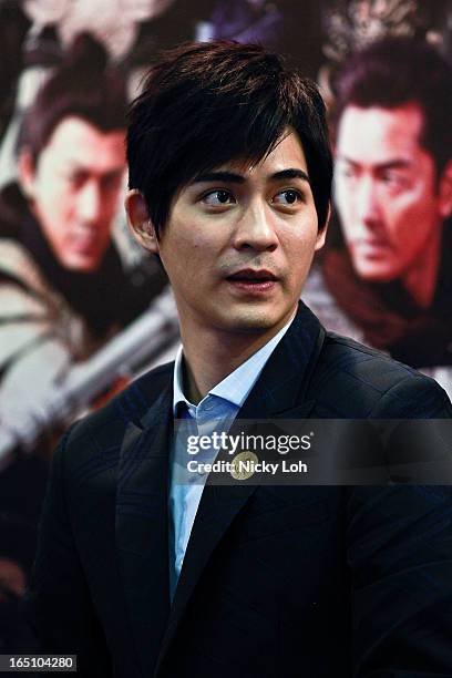 Actor Vic Chou of "Saving General Yang" speaks to fans at a meet and greet event in Square 2 on March 30, 2013 in Singapore.