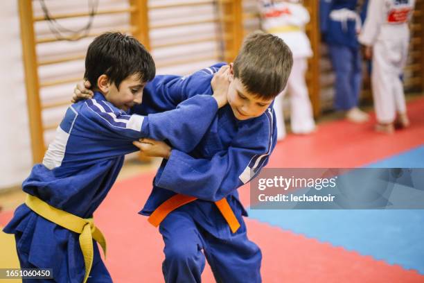 judo practice session - judo kids stock pictures, royalty-free photos & images