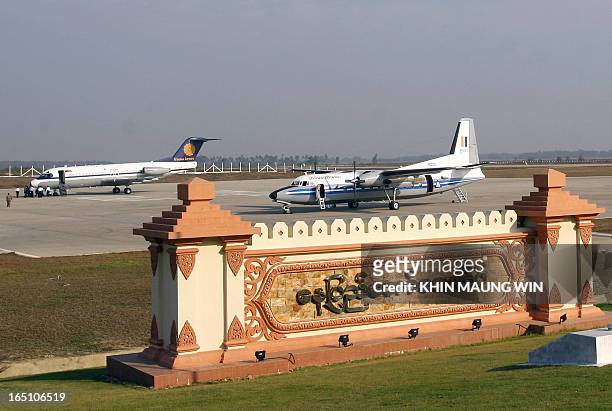 Aircraft are seen at the airport in Naypyidaw, 17 December 2006. Myanmar, one of the world's poorest nations, is under a series of US and European...