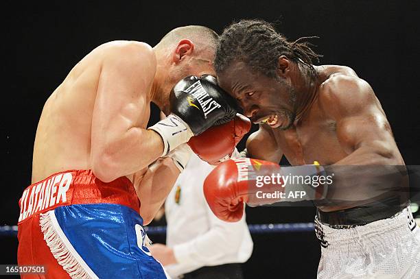 Belgian 'Sugar' Jackson Osei Bonsu fights against French Franck Haroche Horta during the eleventh edition of the Gent Boksgala boxing event, in...