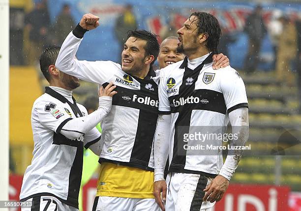 Amauri Carvalho De Oliveira of Parma FC celebrates with Nicola Sansone after scoring the third goal during the Serie A match between Parma FC and...