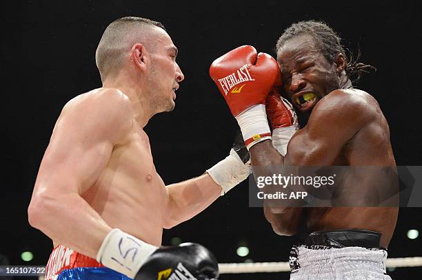 Belgian 'Sugar' Jackson Osei Bonsu fights against French Franck Haroche Horta during the eleventh edition of the Gent Boksgala boxing event, in...