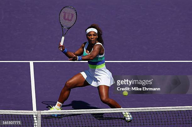 Serena Williams plays against Maria Sharapova of Russia in the final of the Sony Open at Crandon Park Tennis Center on March 30, 2013 in Key...