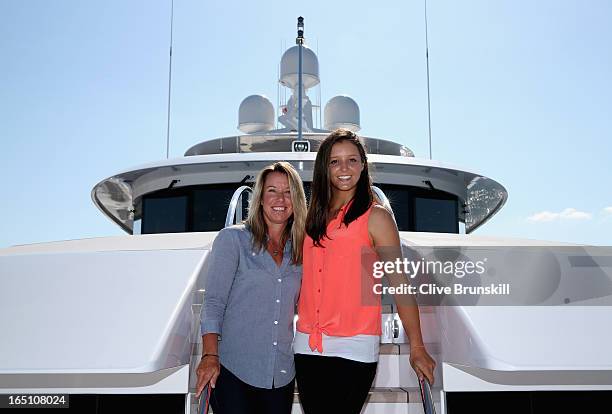 Laura Robson of Great Britain and Lisa Raymond of the USA relax prior to their doubles final tomorrow against Nadia Petrova of Russia and Katarina...