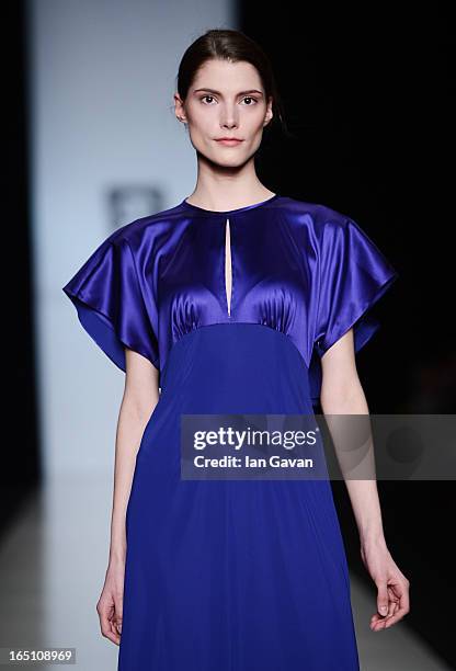 Model walks the runway at the Olga Brovkina show during Mercedes-Benz Fashion Week Russia Fall/Winter 2013/2014 at Manege on March 30, 2013 in...