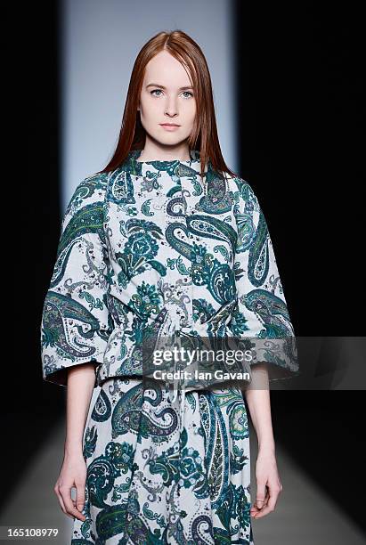 Model walks the runway at the Olga Brovkina show during Mercedes-Benz Fashion Week Russia Fall/Winter 2013/2014 at Manege on March 30, 2013 in...