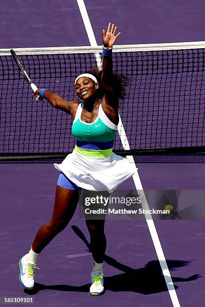 Serena Williams celebrates her win over Maria Sharapova of Russia during the final of the Sony Open at Crandon Park Tennis Center on March 30, 2013...