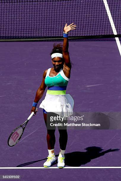 Serena Williams celebrates her win over Maria Sharapova of Russia during the final of the Sony Open at Crandon Park Tennis Center on March 30, 2013...