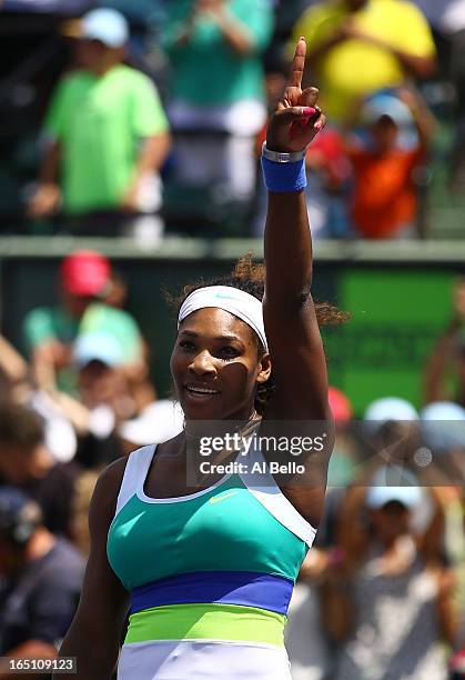 Serena Williams of the USA celebrates match point against Maria Sharapova of Russia during the Womens Final match of the Sony Open on Day 13 at...