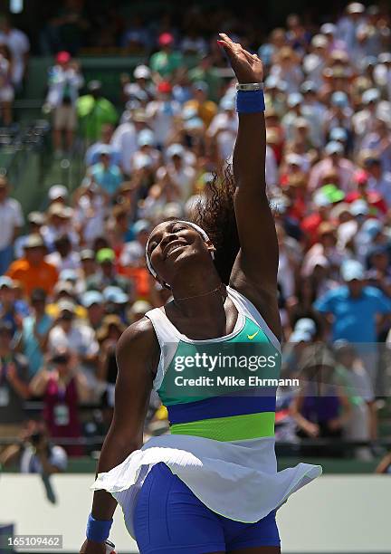 Serena Williams celebrates after winning against Maria Sharapova of Russia in the final of the Sony Open at Crandon Park Tennis Center on March 30,...