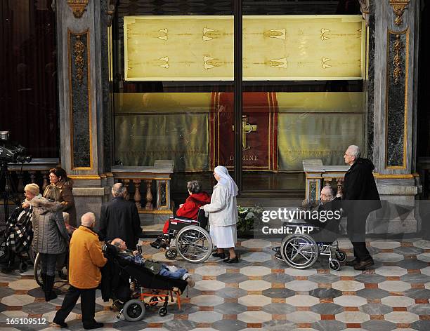 Picture shows "The Shroud of Turin" on March 30, 2013 in the Turin cathedral. On Holy Saturday, the linen cloth imprinted with the faint brownish...