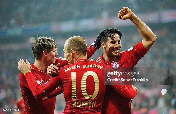 Claudio Pizarro of Bayern Muenchen celebrates scoring his team's sixth goal during the Bundesliga match between FC Bayern Muenchen and Hamburger SV...