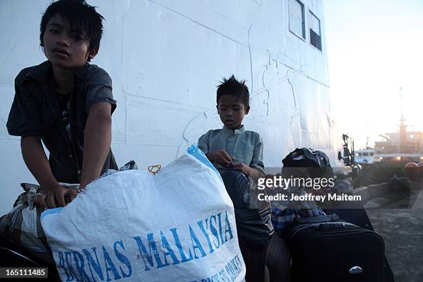 Children displaced by continuing armed conflict between the supporters of Philippine Muslim clan Sulu Sultan Jamalul Kiram III and Royal Malaysian...