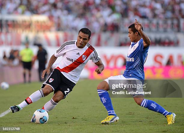 Gabriel Mercado of River Plate struggles for the ball with Brian Ferreira of Velez Sarsfield during a match between River Plate and Velez as part of...