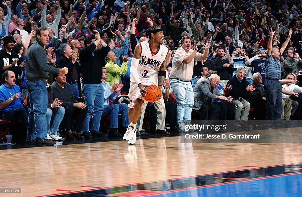 Iverson and fans celebrate the overtime win