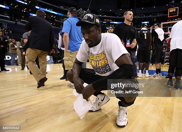 Ehimen Orukpe of the Wichita State Shockers celebrates after defeating the Ohio State Buckeyes 70-66 during the West Regional Final of the 2013 NCAA...