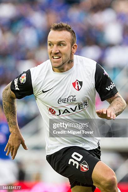 Matias Vuoso of Atlas celebrates after scoring during a match between Cruz Azul and Atlas as part of the Clausura 2013 at Azul Stadium on MArch 30,...