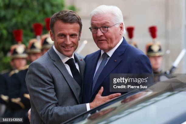 French President Emmanuel Macron greets German President Frank-Walter Steinmeier at Elysee Palace on August 31, 2023 in Paris, France.