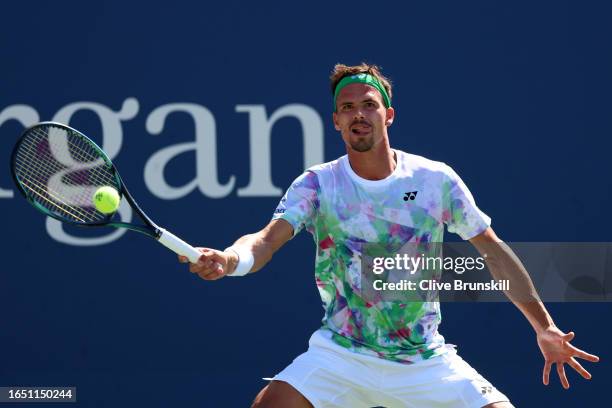 Daniel Altmaier of Germany returns a shot against Alexander Zverev of Germany during their Men's Singles Second Round match on Day Four of the 2023...