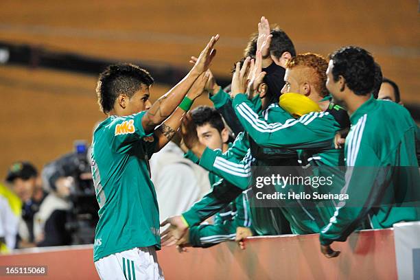 Leandro of Palmeiras celebrates a goal during the match between Palmeiras and Linense as part of Paulista Championship 2013 at Pacaembu Stadium on...