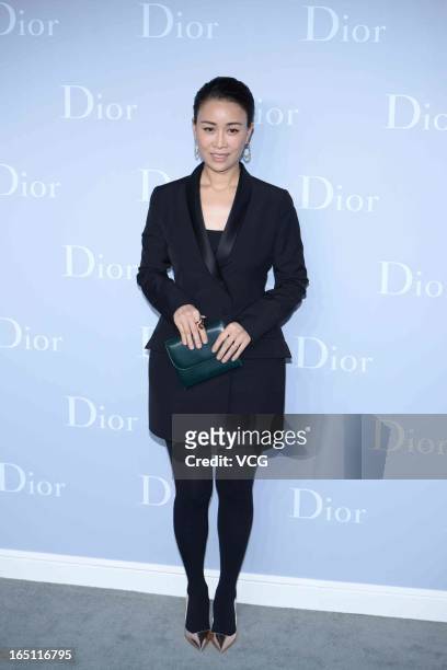 Singer Na Ying attends Christian Dior S/S 2013 Haute Couture Collection at Five on the Bund on March 30, 2013 in Shanghai, China.
