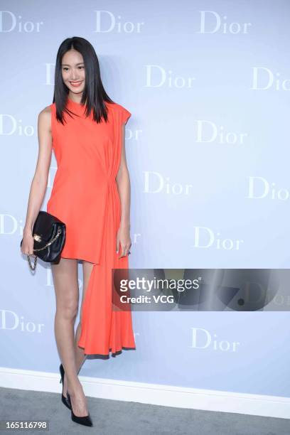 Model Qin Shupei attends Christian Dior S/S 2013 Haute Couture Collection at Five on the Bund on March 30, 2013 in Shanghai, China.