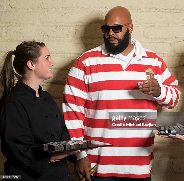 Music producer Suge Knight enjoys chocolate from "Michelle Haut Chocolat" at Posing Heroes, "A Dog Day Afternoon" Benefiting A Wish For Animals on...