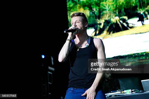 Rapper/musician Macklemore performs onstage during the 2013 Paid Dues Independent Hip Hop Festival at San Manuel Amphitheater on March 30, 2013 in...