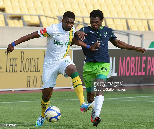Katlego Mphela of Sundowns and Enocent Mkhabela of the Stars compete for the ball during the Absa Premiership match between Platinum Stars and...