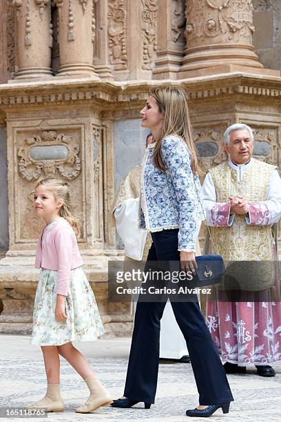 Princess Letizia of Spain and her daugther Princess Leonor of Spain attend Easter Mass at the Cathedral of Palma de Mallorca on March 31, 2013 in...