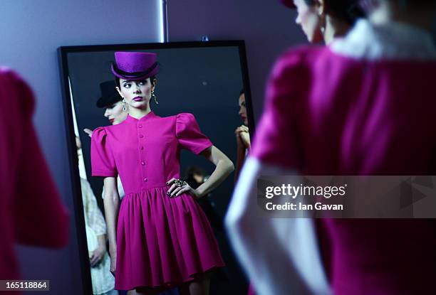 Model prepares backstage at the Mari Axel show during Mercedes-Benz Fashion Week Russia Fall/Winter 2013/2014 at Manege on March 31, 2013 in Moscow,...