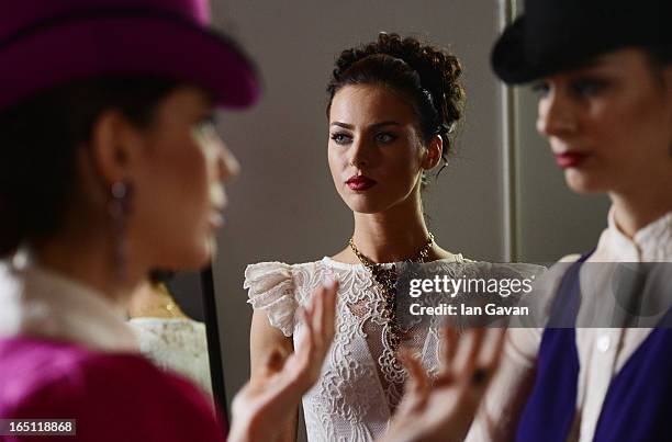 Models prepare backstage at the Mari Axel show during Mercedes-Benz Fashion Week Russia Fall/Winter 2013/2014 at Manege on March 31, 2013 in Moscow,...