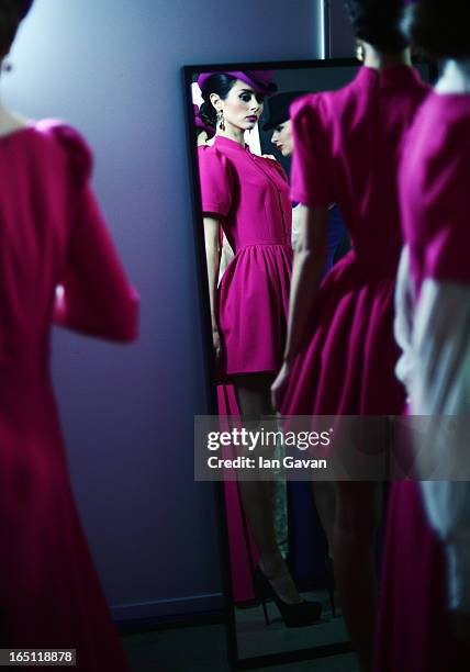 Model prepares backstage at the Mari Axel show during Mercedes-Benz Fashion Week Russia Fall/Winter 2013/2014 at Manege on March 31, 2013 in Moscow,...