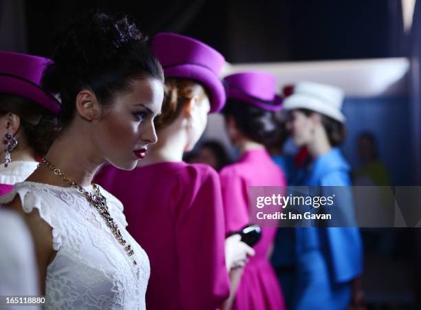 Models prepare backstage at the Mari Axel show during Mercedes-Benz Fashion Week Russia Fall/Winter 2013/2014 at Manege on March 31, 2013 in Moscow,...