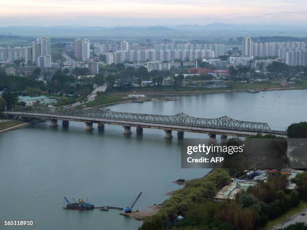 NKorea-economy-politics-succession,FEATURE by Ian Timberlake This photo taken on September 22, 2010 shows the center of Pyongyang with the Taedong...