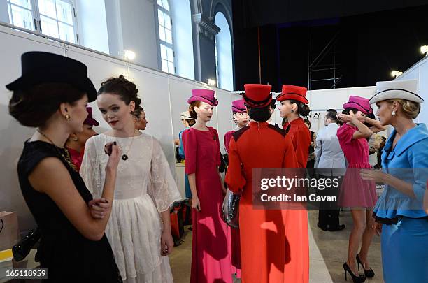 Models prepare backstage at the Mari Axel show during Mercedes-Benz Fashion Week Russia Fall/Winter 2013/2014 at Manege on March 31, 2013 in Moscow,...