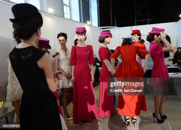 Models prepare backstage at the Mari Axel show during Mercedes-Benz Fashion Week Russia Fall/Winter 2013/2014 at Manege on March 31, 2013 in Moscow,...