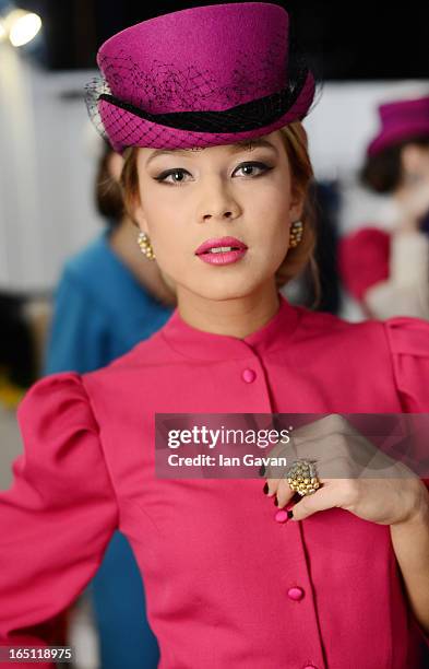 Model prepares backstage at the Mari Axel show during Mercedes-Benz Fashion Week Russia Fall/Winter 2013/2014 at Manege on March 31, 2013 in Moscow,...