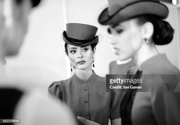 Model prepares backstage at the Mari Axel show during Mercedes-Benz Fashion Week Russia Fall/Winter 2013/2014 at Manege on March 31, 2013 in Moscow,...