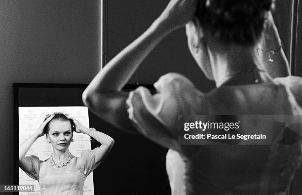 Model prepares backstage at the Mari Axel show during Mercedes-Benz Fashion Week Russia Fall/Winter 2013/2014 at Manege on March 31, 2013 in Moscow,...