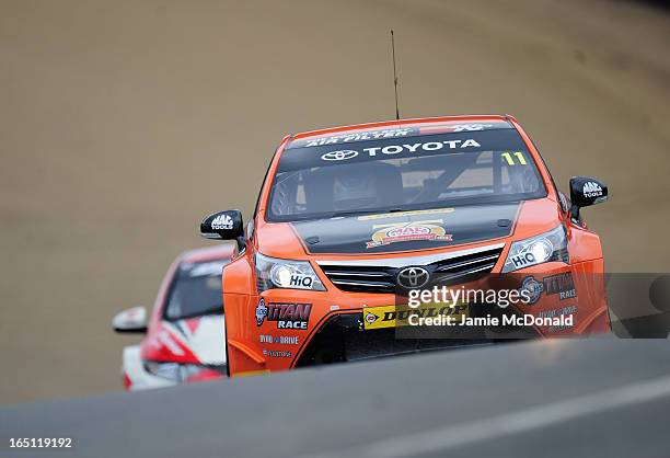 Frank Wrathall of Great Britain and Team Dynojet drives into Druids Corner during the British Touring Car Championship at Brands Hatch on March 31,...